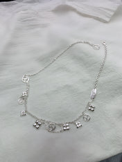 STAR AND SUN MULTI CHARM SILVER NECKLACE