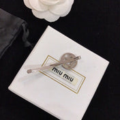 MIUMIU 26S CRYSTAL HEART LOGO HAIR CLIP IN SILVER TONE METAL 617641