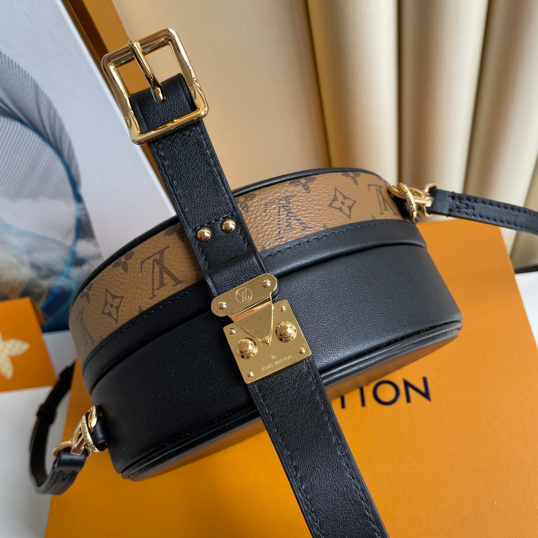LV 25S PETITE BOITE CHAPEAU 17 IN BLACK MONOGRAM REVERSE CALFSKIN