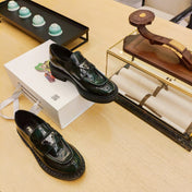 PRADA 26S PENNY LOAFERS 55MM IN GREEN PATENT CALFSKIN