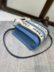 SMALL STRAP WOODY TOTE BAG 26.5 IN BLUE DENIM CANVAS DARK BLUE CALFSKIN
