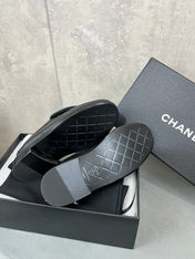 CHANEL 26S LOAFERS IN BLACK QUILTED CALFSKIN WITH CC LOGO