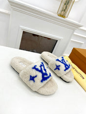 LV FLAT SLIPPER IN WHITE MIX COBALT BLUE SHEARLING