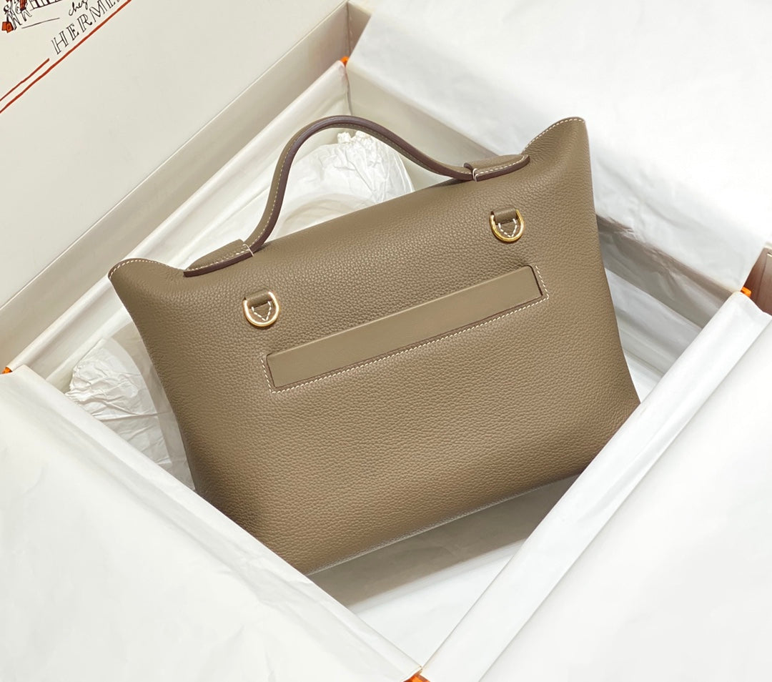 HM 26S 24/24 29MM IN BROWN EVERCOLOR CALFSKIN GOLD KELLY BUCKLE