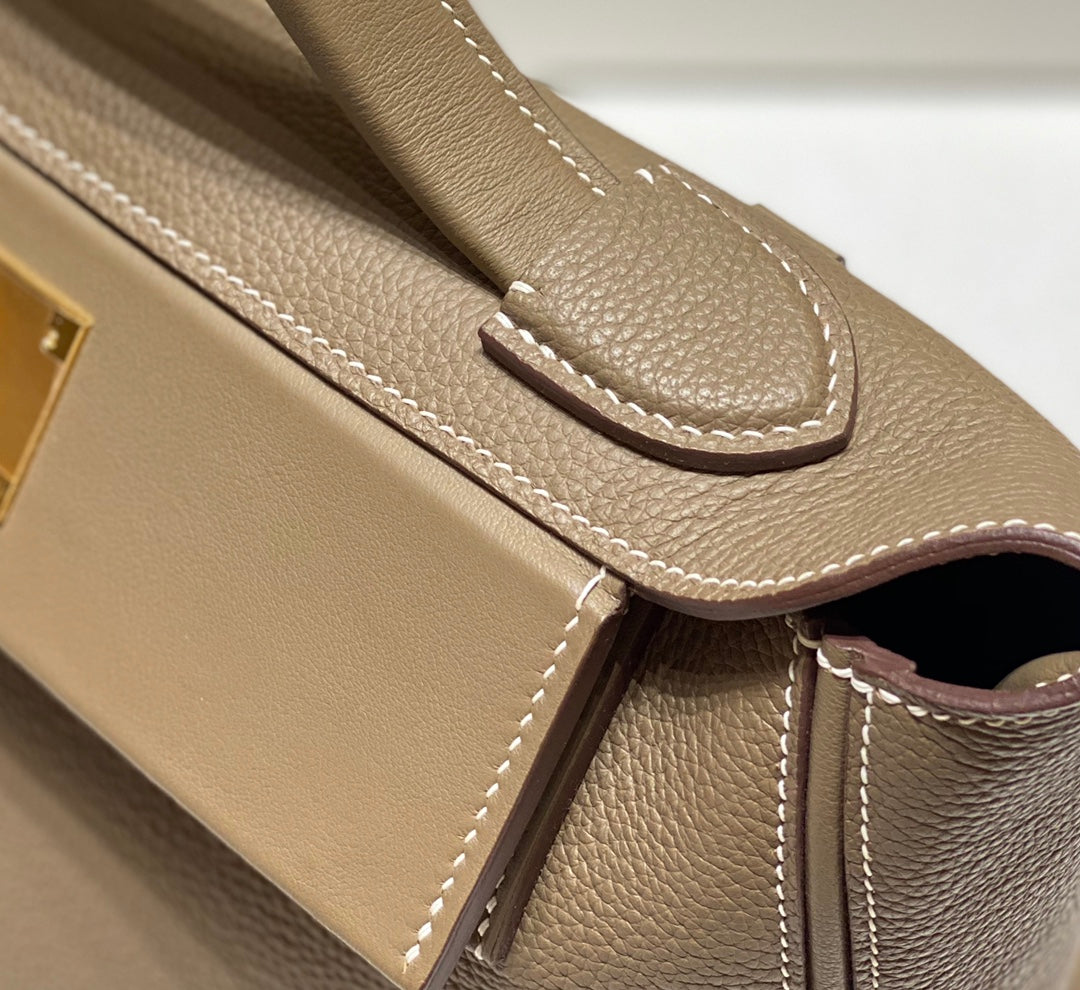 HM 26S 24/24 29MM IN BROWN EVERCOLOR CALFSKIN GOLD KELLY BUCKLE