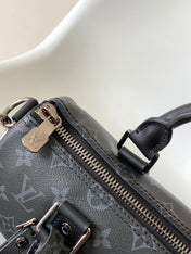 KEEPALL BANDOULIÈRE 25 IN BLACK MONOGRAM HERITAGE CANVAS