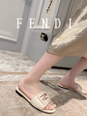 FENDI BAGUETTE SLIDES IN WHITE LAMBSKIN