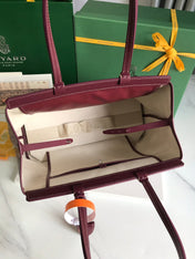 BELLECHASSE BIAUDE PM BAG 36 IN WINE RED GOYARDINE CANVAS AND CALFSKIN TRIM