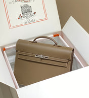 KELLY DEPECHES 38 BRIEFCASE IN ETOUPE TOGO CALFSKIN SILVER HARDWARE