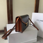 CELINE 25S WALLET MARGO 22MM IN BLACK TRIOMPHE CANVAS AND BROWN CALFSKIN