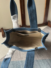 MEDIUM WOODY TOTE BAG 37 IN BLUE DENIM BLACK CALFSKIN