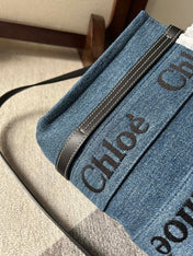 SMALL WOODY TOTE BAG 26.5 IN BLUE DENIM BLACK CALFSKIN