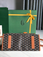 SAINT LÉGER BACKPACK 35 IN BROWN GOYARDINE CANVAS AND CALFSKIN WITH CARTOON PATCH