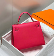 KELLY 25CM IN ROSE TYRIEN SWIFT CALFSKIN GOLD HARDWARE