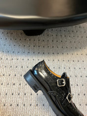 MIUMIU 26S CHURCH BROGUE MONK STRAP SHOES IN BLACK PATENT CALFSKIN