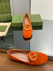BLONDIE LOGO-PLAQUE LOAFERS IN TIGER ORANGE SUEDE WITH GOLD HARDWARE