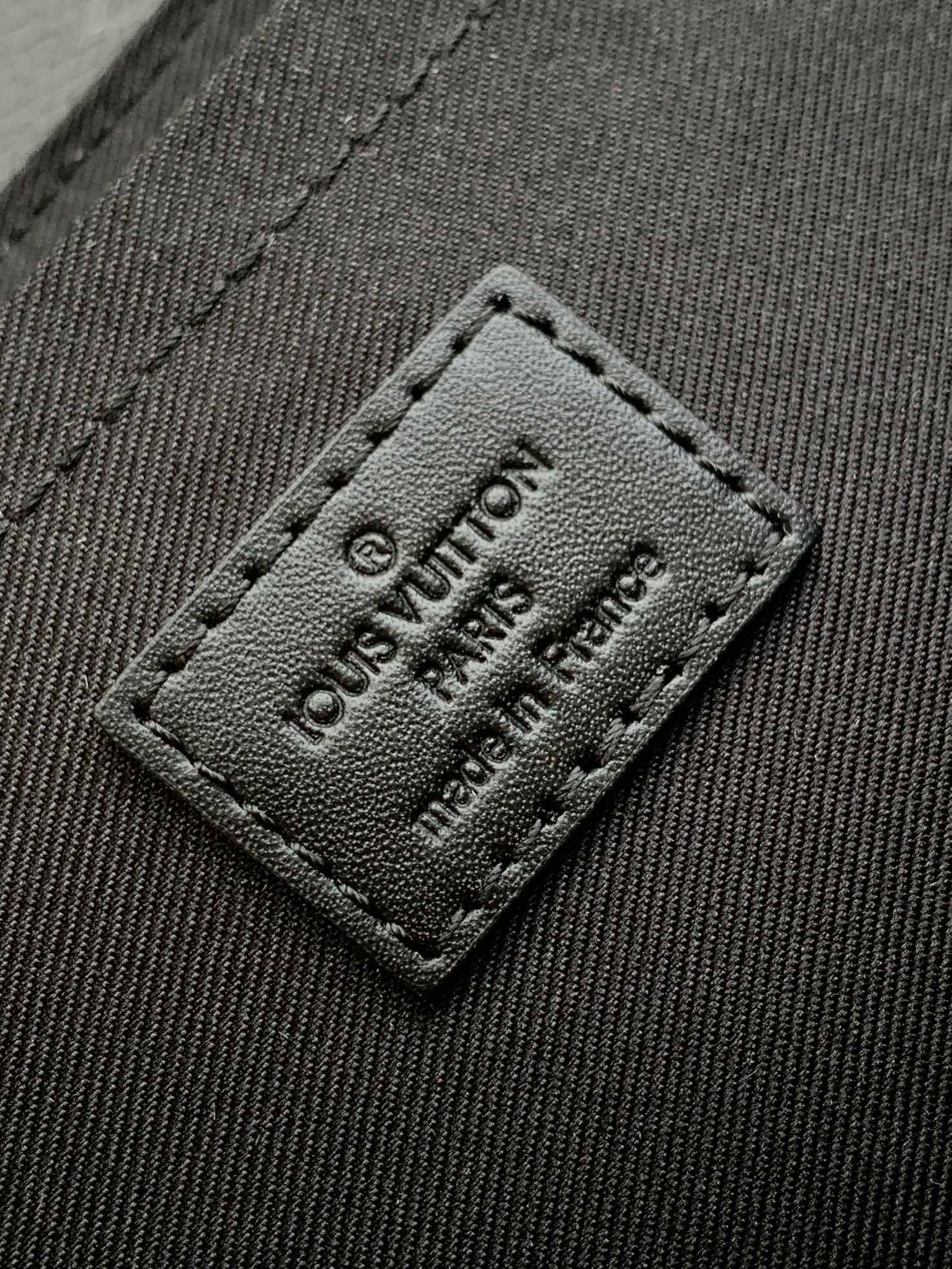 S-CAPE MESSENGER BAG 28 IN BLACK MONOGRAM ECLIPSE CANVAS