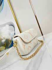 WALLET ON CHAIN IVY 23 IN WHITE PINK MONOGRAM EMPREINTE LEATHER