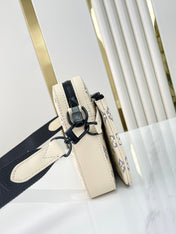 TRIO MESSENGER 25 IN CREAM BLUE MONOGRAM SHADOW CALFSKIN