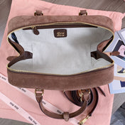 ARCADIE BAG 27 IN PENNY BROWN SUEDE GOLD HARDWARE