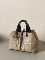 MEDIUM TOUJOURS BAG 28 IN BEIGE CANNAGE CALFSKIN BLACK STRAP