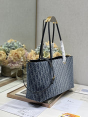 MEDIUM 37 TOUJOURS BAG IN BLUE MONOGRAM DENIM