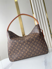 SLOUCHY MM 40 IN BROWN MONOGRAM CANVAS