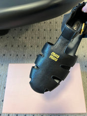 MIUMIU 26S FISHERMAN SANDALS IN BLACK RUCHES NAPPA CALFSKIN