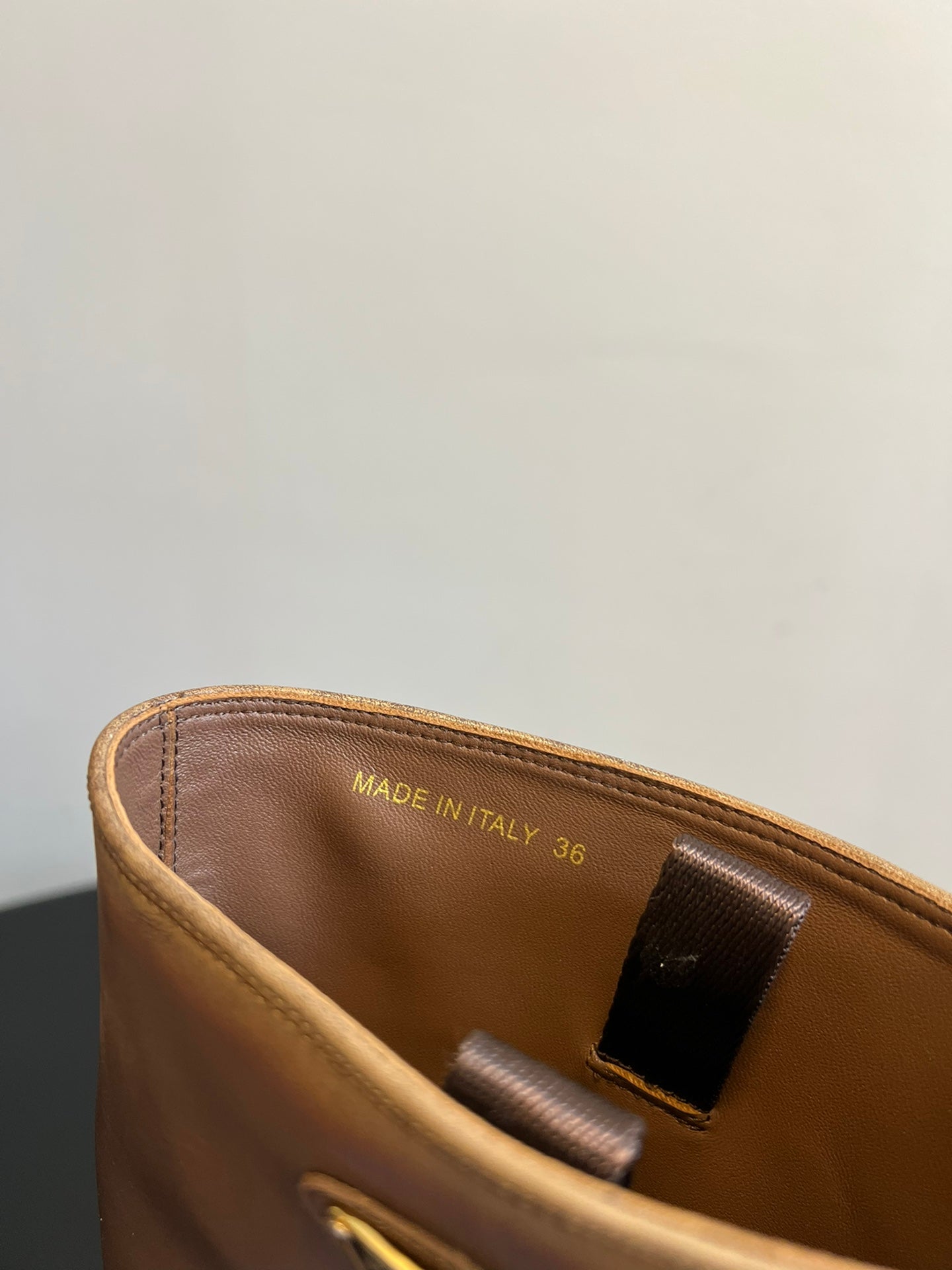 PRADA 25S HIGH-CUT PLATFORM BOOTS IN BROWN CALFSKIN WITH GOLD HARDWARE