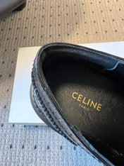 CELINE 26S SAINTNJORD TASSEL LOAFER 50 MM IN BLACK CALFSKIN
