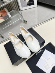 CHANEL 26S MARY JANE FLATS IN WHITE CALFSKIN