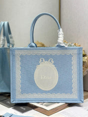 DIOR 26S BOOK TOTE BAG 36 IN BLUE AND WHITE LACE BAYADERE FABRIC