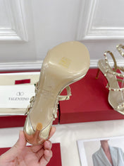 ROCKSTUD 100 GOLD METALLIC CALFSKIN ANKLE STRAP HIGH SANDAL