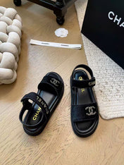 CC SANDALS IN BLACK FUR GOLD HARDWARE