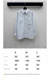 CHANEL STRIPED EMBROIDERED LOGO SHIRT WITH VERTICAL STRIPES