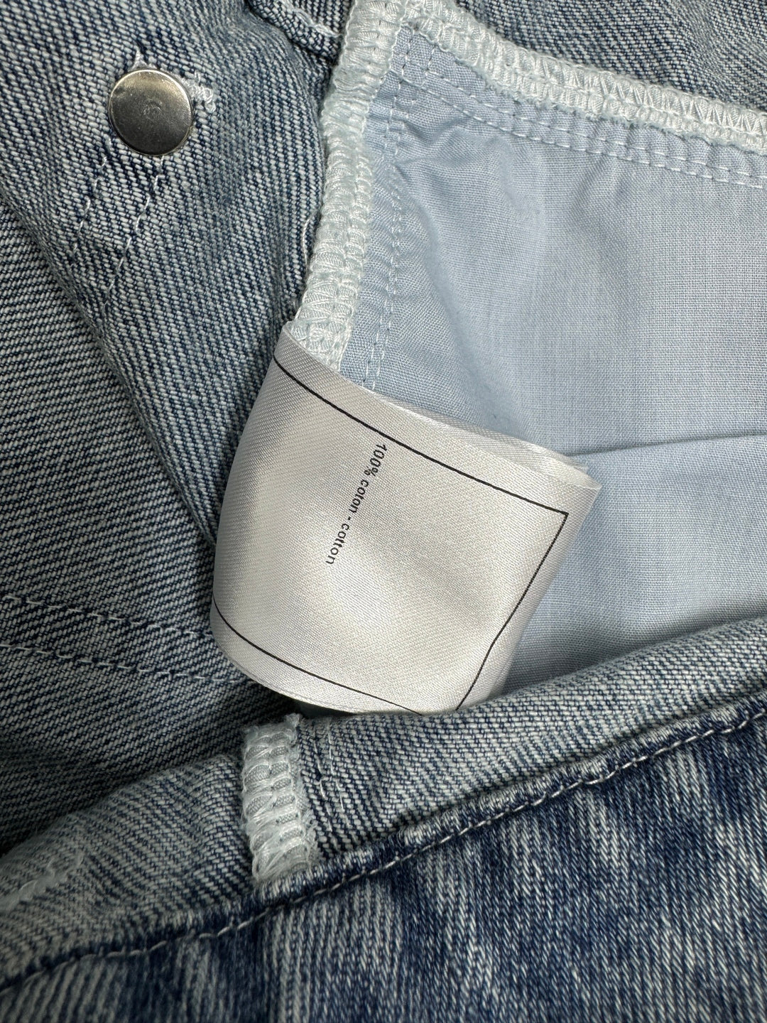 CHANEL HIGH-WAIST STRAIGHT-LEG DENIM PANTS