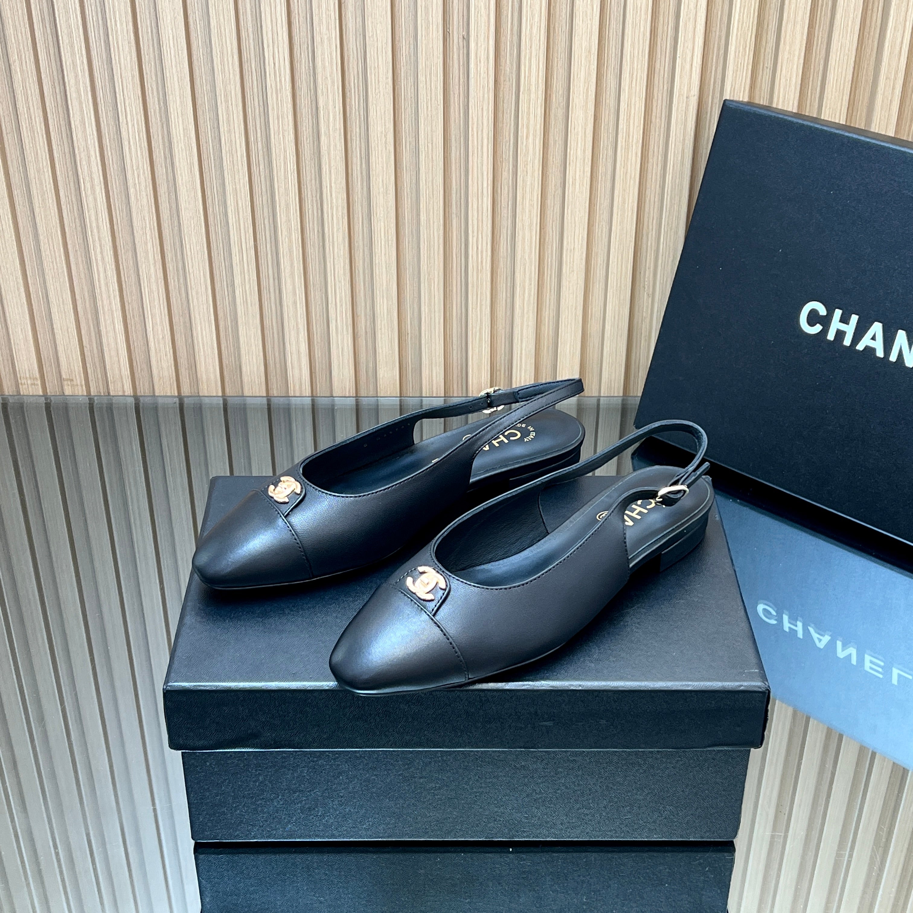 CHANEL 25S SLINGBACK FLATS IN BLACK CALFSKIN GOLD HARDWARE