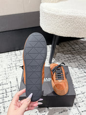 PRADA 25S DEXUN MULE IN BURNT ORANGE SUEDE LEATHER