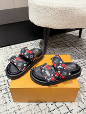 LV TWO-STRAP SLIDES 25S IN BLACK FABRIC AND CALFSKIN