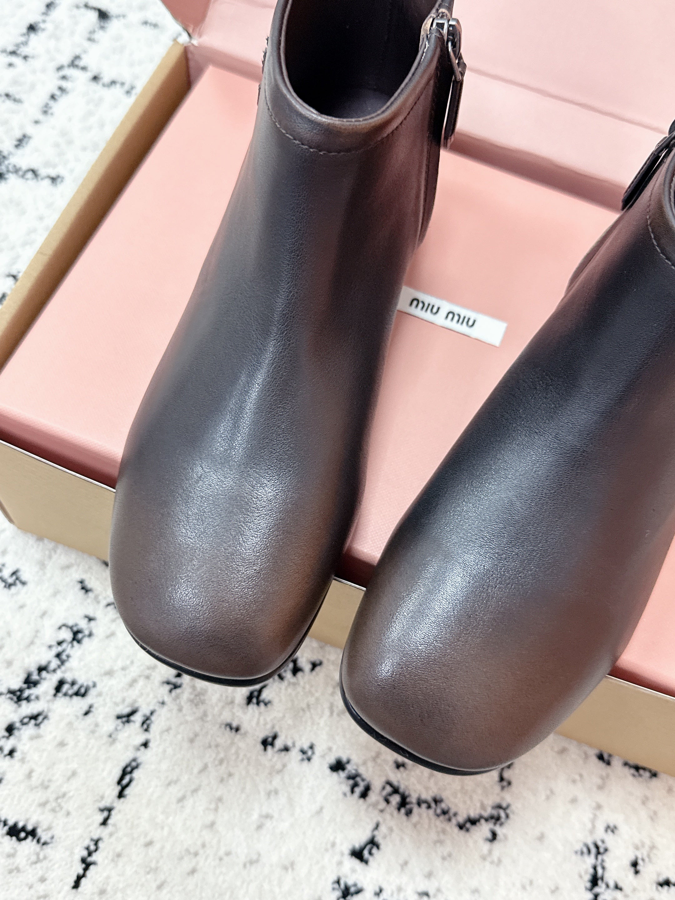 MIUMIU 26S BOOTIES IN DARK BROWN  FUME CALFSKIN