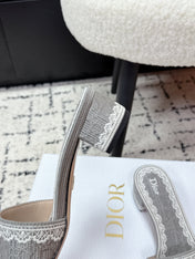 DIOR 26S HIGH HEEL SLIDES IN GREY EMBOSSED OBLIQUE LACE EMBROIDERY