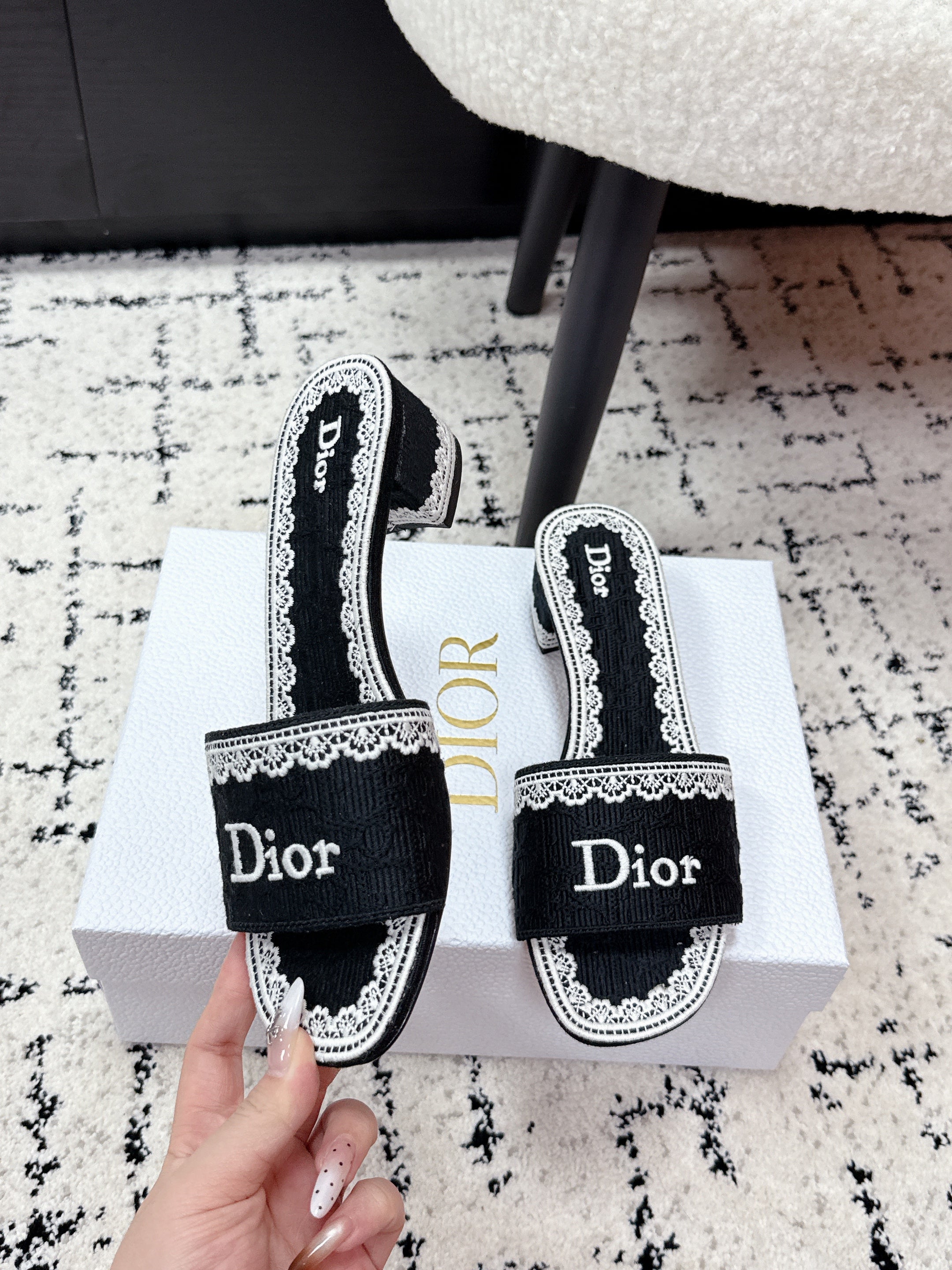 DIOR 26S HIGH HEEL SLIDES IN BLACK AND WHITE EMBOSSED OBLIQUE LACE EMBROIDERY