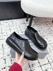 PRADA 26S SLIP ON SHOES IN BLACK SMOOTH CALFSKIN