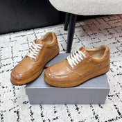 PRADA 26S SNEAKERS IN GOLDEN BROWN SHINY CALFSKIN