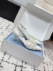 PRADA 26S POINTED-TOE HIGH HEELS 55MM IN WHITE CALFSKIN WITH BOW