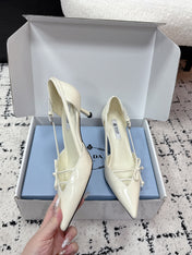 PRADA 26S POINTED-TOE HIGH HEELS 55MM IN IVORY WHITE CALFSKIN WITH BOW