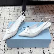 PRADA 26S SLINGBACK PUMPS 60MM IN WHITE PATENT CALFSKIN