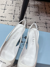 PRADA 26S SLINGBACK PUMPS 60MM IN WHITE PATENT CALFSKIN