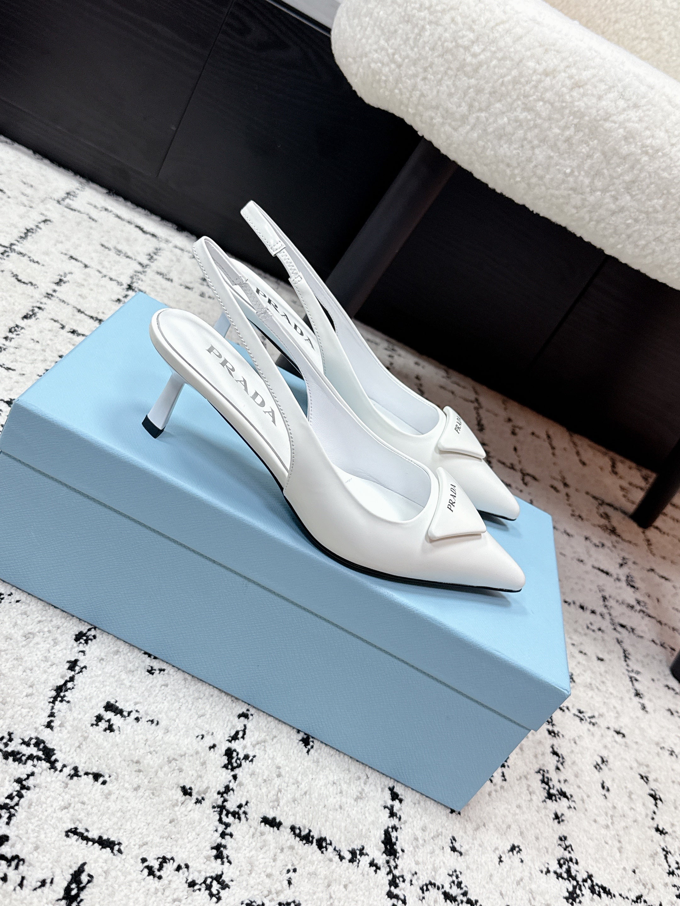 PRADA 26S SLINGBACK PUMPS 60MM IN WHITE PATENT CALFSKIN