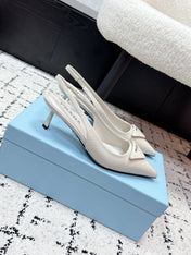 PRADA 26S SLINGBACK PUMPS 60MM IN CREAM WHITE PATENT CALFSKIN